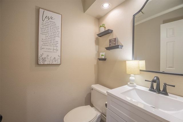 half bath with toilet and vanity