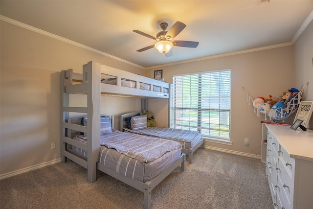 bedroom featuring ornamental molding, baseboards, carpet flooring, and ceiling fan