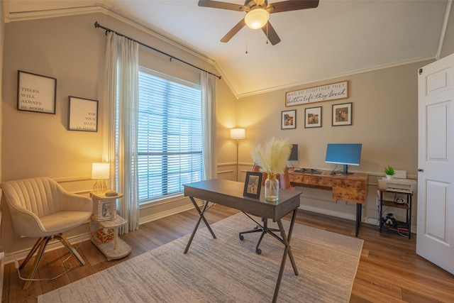 home office with crown molding, a ceiling fan, wood finished floors, and lofted ceiling
