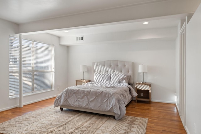 4122 Travis St Unit 7, Dallas, TX 75204 - bedroom featuring wood finished floors and recessed lighting