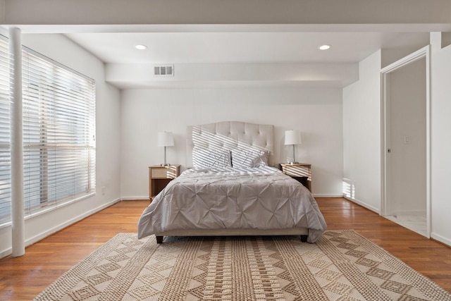 4122 Travis St Unit 7, Dallas, TX 75204 - bedroom featuring wood finished floors and recessed lighting