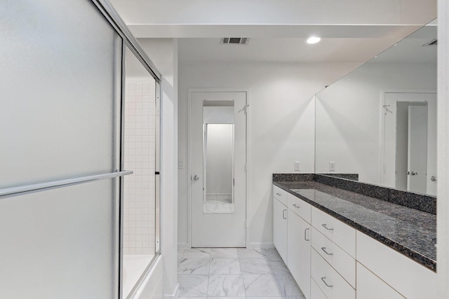 4122 Travis St Unit 7, Dallas, TX 75204 - bathroom with vanity, marble look tile flooring, recessed lighting, and bath / shower combo with glass door