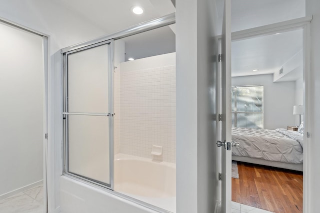 4122 Travis St Unit 7, Dallas, TX 75204 - ensuite bathroom with combined bath / shower with glass door and recessed lighting