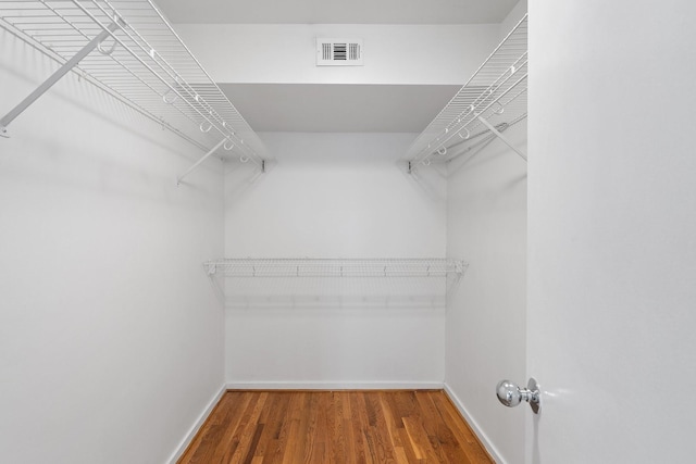 4122 Travis St Unit 7, Dallas, TX 75204 - spacious closet featuring wood finished floors