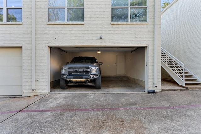 4122 Travis St Unit 7, Dallas, TX 75204 - garage featuring driveway