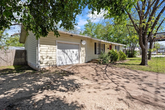 302 S S Ave G, Clifton, TX 76634 - view of front of house featuring fence, driveway, and a garage