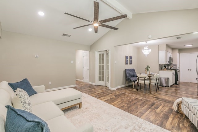 1807 Lachelle Ln, Arlington, TX 76010 - living room featuring dark wood-style floors, beamed ceiling, a ceiling fan, baseboards, and high vaulted ceiling