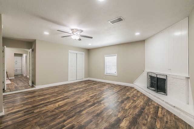 1807 Lachelle Ln, Arlington, TX 76010 - unfurnished living room with a fireplace, dark wood finished floors, a ceiling fan, baseboards, and recessed lighting
