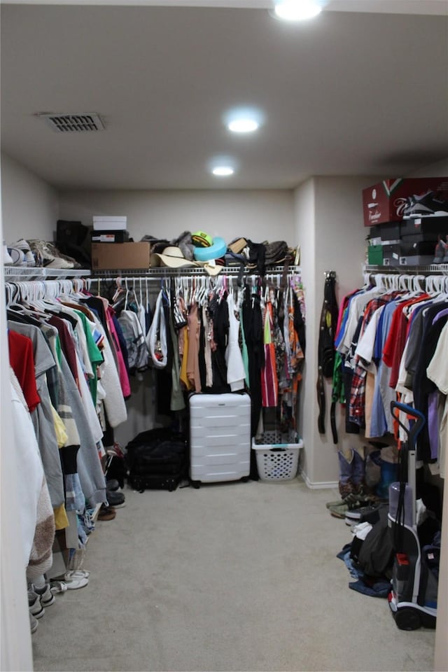 12824 Kingsgate Dr, Rhome, TX 76078 - walk in closet featuring visible vents and carpet flooring