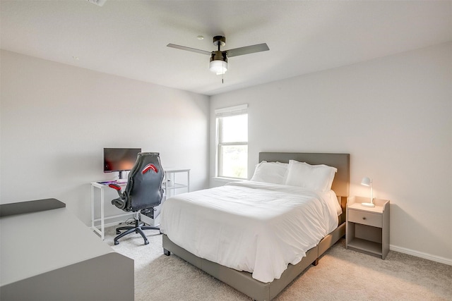 628 Bronze Forest Dr, Fort Worth, TX 76131 - bedroom featuring light carpet, an office area, baseboards, and ceiling fan