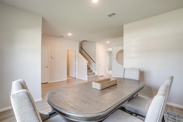 628 Bronze Forest Dr, Fort Worth, TX 76131 - dining room featuring stairs, light wood-type flooring, recessed lighting, and baseboards