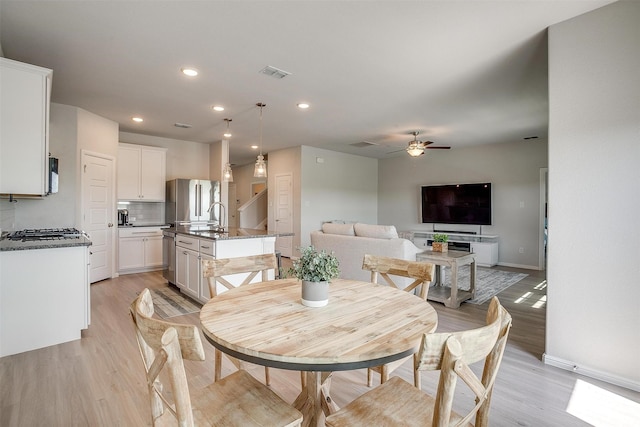 628 Bronze Forest Dr, Fort Worth, TX 76131 - dining room featuring light wood finished floors, baseboards, recessed lighting, and ceiling fan