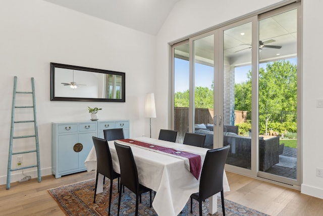808 Bluestem Dr, Aubrey, TX 76227 - dining space with ceiling fan, lofted ceiling, light wood-type flooring, and baseboards