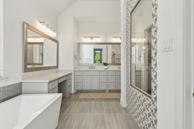 808 Bluestem Dr, Aubrey, TX 76227 - full bathroom featuring a soaking tub, vanity, tiled shower, and tile patterned floors
