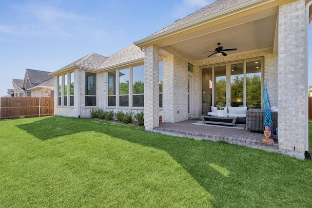 808 Bluestem Dr, Aubrey, TX 76227 - back of house featuring a ceiling fan, an outdoor living space, brick siding, a patio area, and a shingled roof