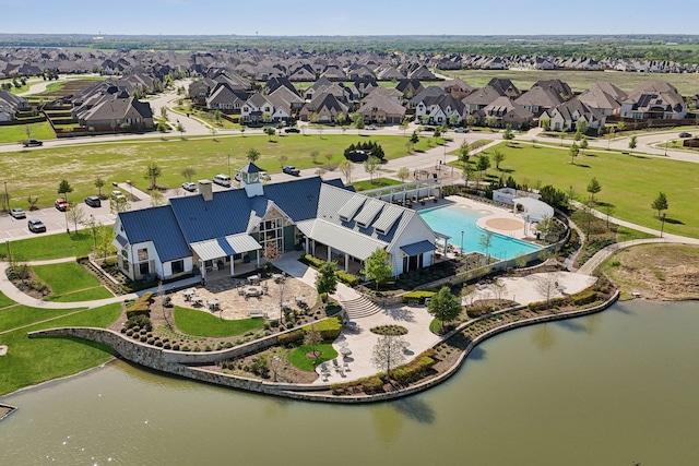808 Bluestem Dr, Aubrey, TX 76227 - aerial perspective of suburban area featuring a pool and a large body of water