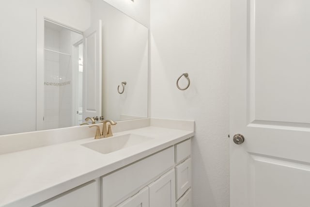 808 Bluestem Dr, Aubrey, TX 76227 - full bathroom featuring vanity and a shower