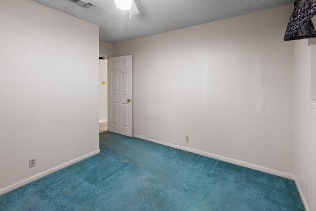 3014 Jennifer Ave, Denison, TX 75020 - carpeted empty room featuring visible vents, baseboards, ceiling fan, and a textured ceiling