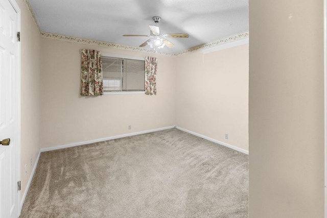 3014 Jennifer Ave, Denison, TX 75020 - unfurnished room with ceiling fan, baseboards, and carpet