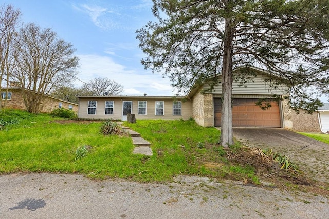 3014 Jennifer Ave, Denison, TX 75020 - ranch-style home with aphalt driveway and an attached garage