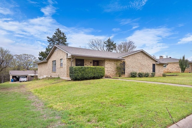 3014 Jennifer Ave, Denison, TX 75020 - ranch-style house with a front yard and brick siding