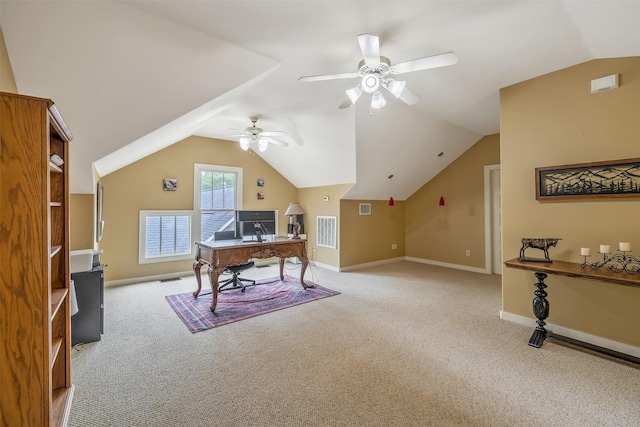 office with lofted ceiling, visible vents, a ceiling fan, and light colored carpet