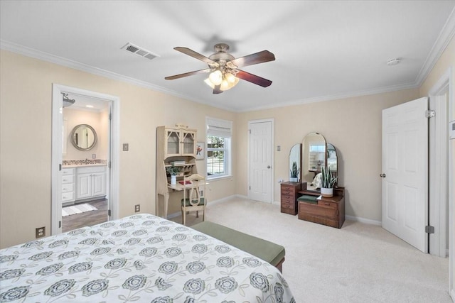 bedroom featuring crown molding, carpet floors, baseboards, a ceiling fan, and ensuite bath