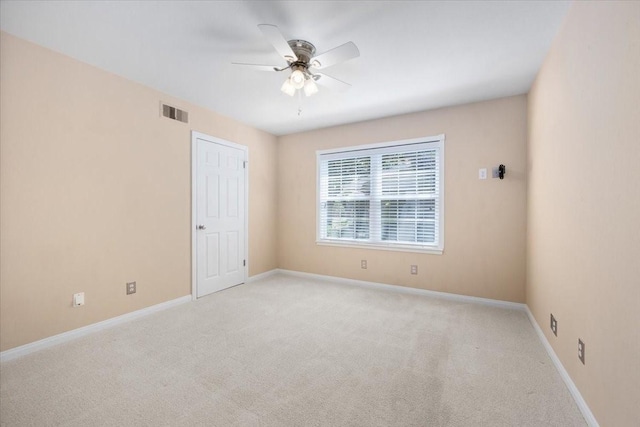 unfurnished room featuring ceiling fan, carpet flooring, and baseboards