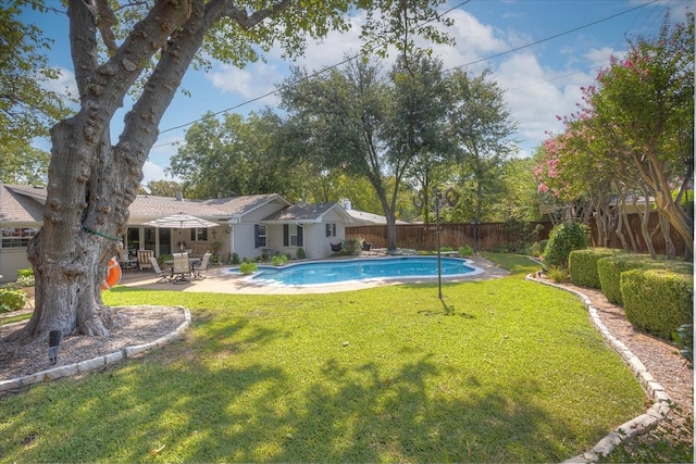 view of swimming pool with a patio area
