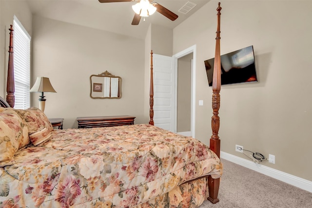 bedroom featuring baseboards, carpet flooring, ceiling fan, and visible vents