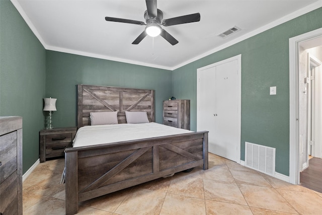 bedroom featuring crown molding, a ceiling fan, visible vents, and baseboards