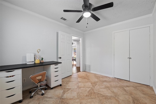 home office featuring a textured ceiling, visible vents, ceiling fan, and ornamental molding