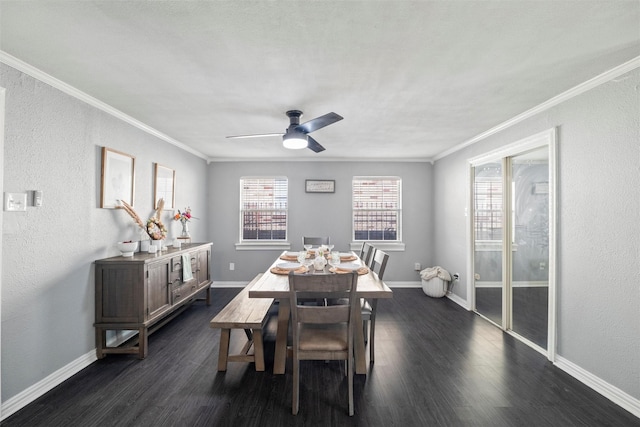 dining area with dark wood-style floors, baseboards, and crown molding
