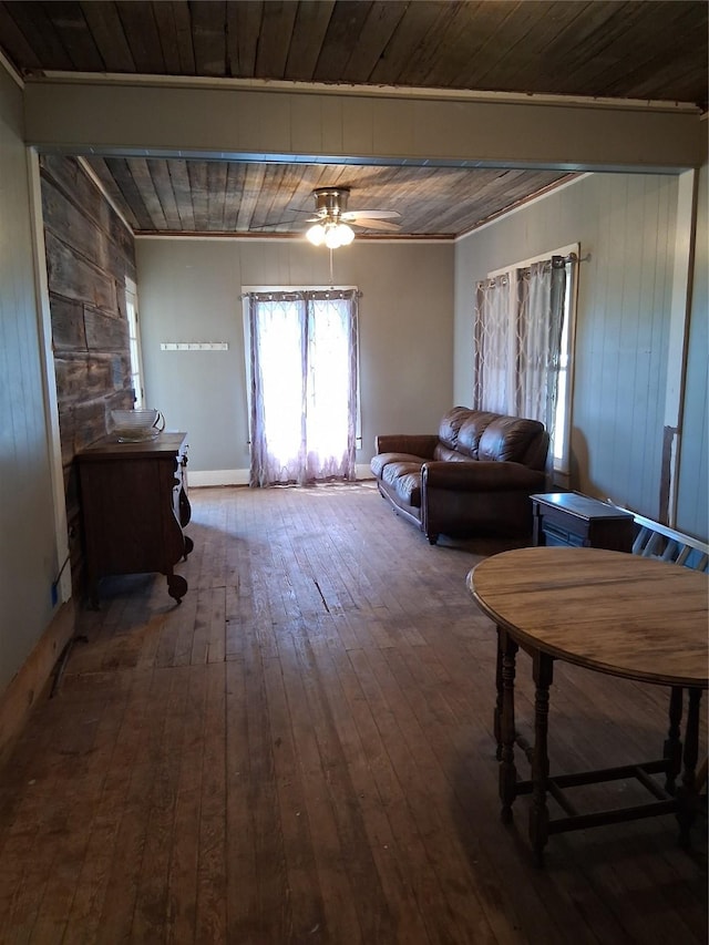 living room with hardwood / wood-style flooring, wooden ceiling, and a ceiling fan