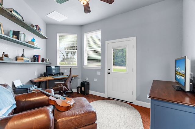 office area with baseboards, a ceiling fan, and wood finished floors