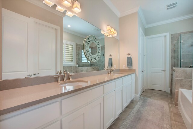 2208 Tremont Blvd, Mckinney, TX 75071 - full bathroom featuring crown molding, tiled shower, double vanity, tile patterned floors, and a tub to relax in