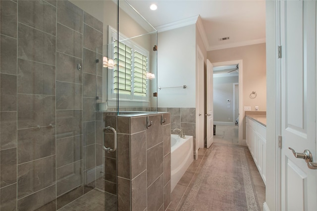 2208 Tremont Blvd, Mckinney, TX 75071 - bathroom featuring crown molding, a shower stall, a garden tub, and vanity