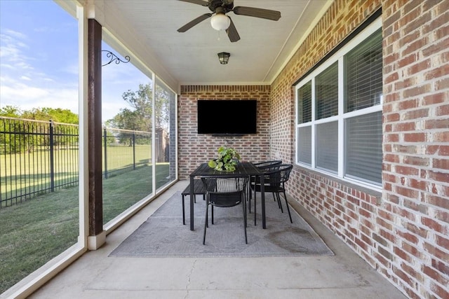 balcony with ceiling fan, outdoor dining area, and a patio area