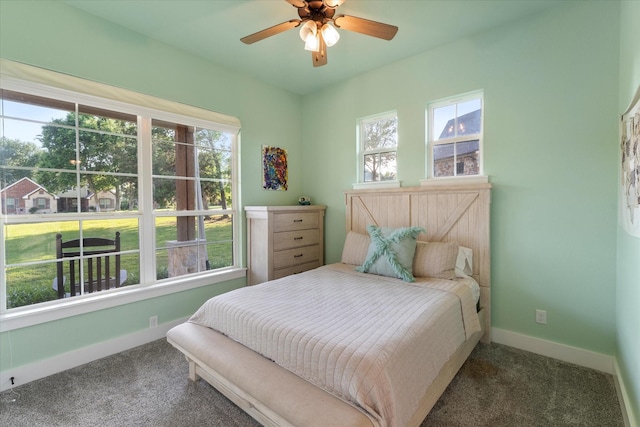 bedroom with baseboards, a ceiling fan, and carpet floors