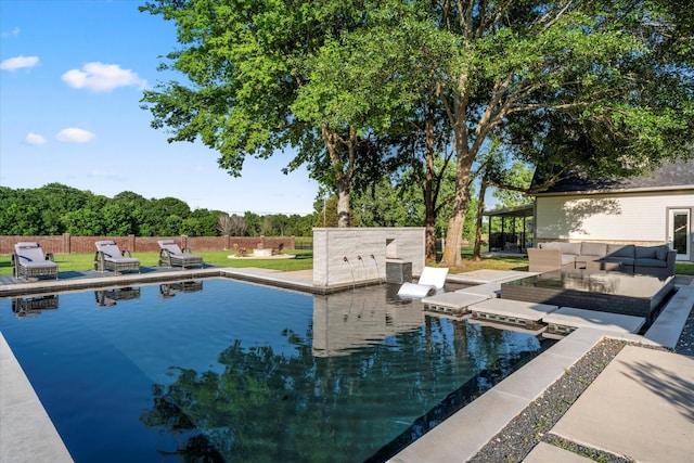 view of pool with a fenced in pool, a patio, outdoor lounge area, and fence