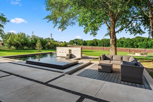 view of patio / terrace with an outdoor living space and fence