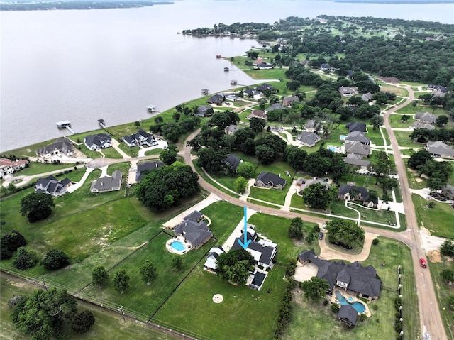 aerial view with a water view and a residential view