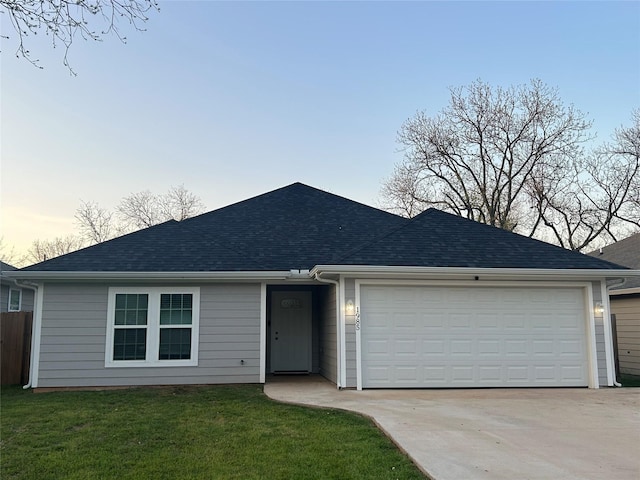 1985 W Bond St, Denison, TX 75020 - single story home featuring concrete driveway, a front lawn, a garage, and roof with shingles