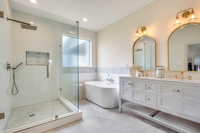860 Prairie Trl, Argyle, TX 76226 - full bath with a soaking tub, a sink, double vanity, and a stall shower
