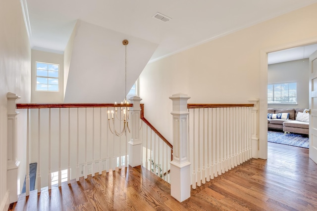 860 Prairie Trl, Argyle, TX 76226 - staircase with ornamental molding, wood finished floors, visible vents, and plenty of natural light