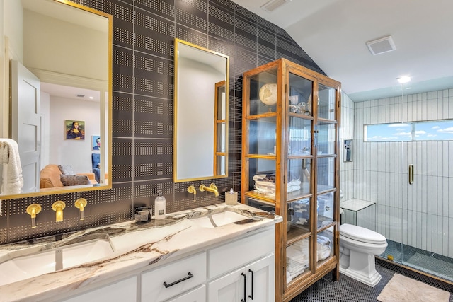 860 Prairie Trl, Argyle, TX 76226 - full bathroom featuring double vanity, visible vents, toilet, a sink, and tile walls