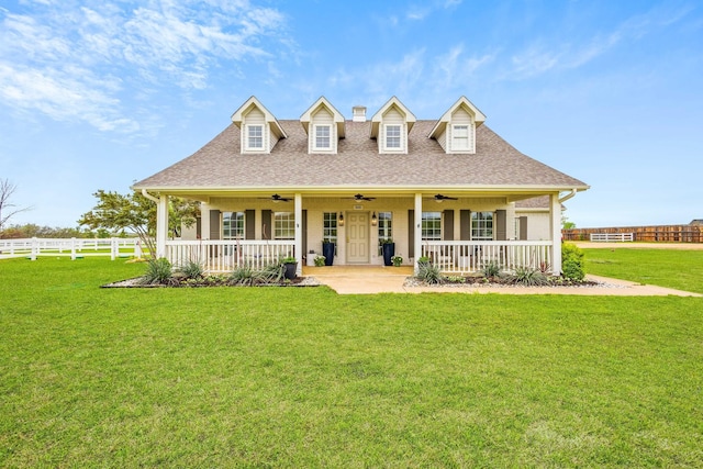 860 Prairie Trl, Argyle, TX 76226 - view of front facade featuring a ceiling fan, a front yard, covered porch, and fence