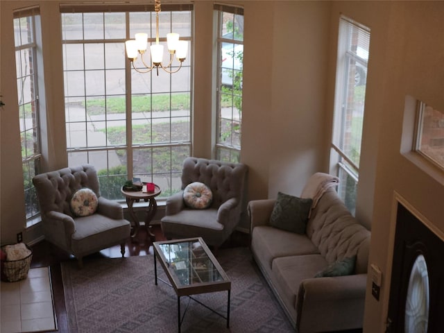 living room featuring an inviting chandelier
