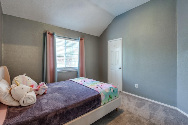bedroom featuring carpet flooring, vaulted ceiling, and baseboards