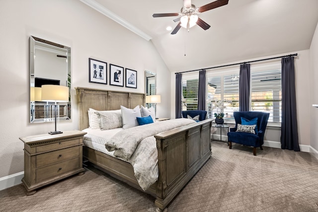 carpeted bedroom featuring crown molding, baseboards, ceiling fan, and lofted ceiling